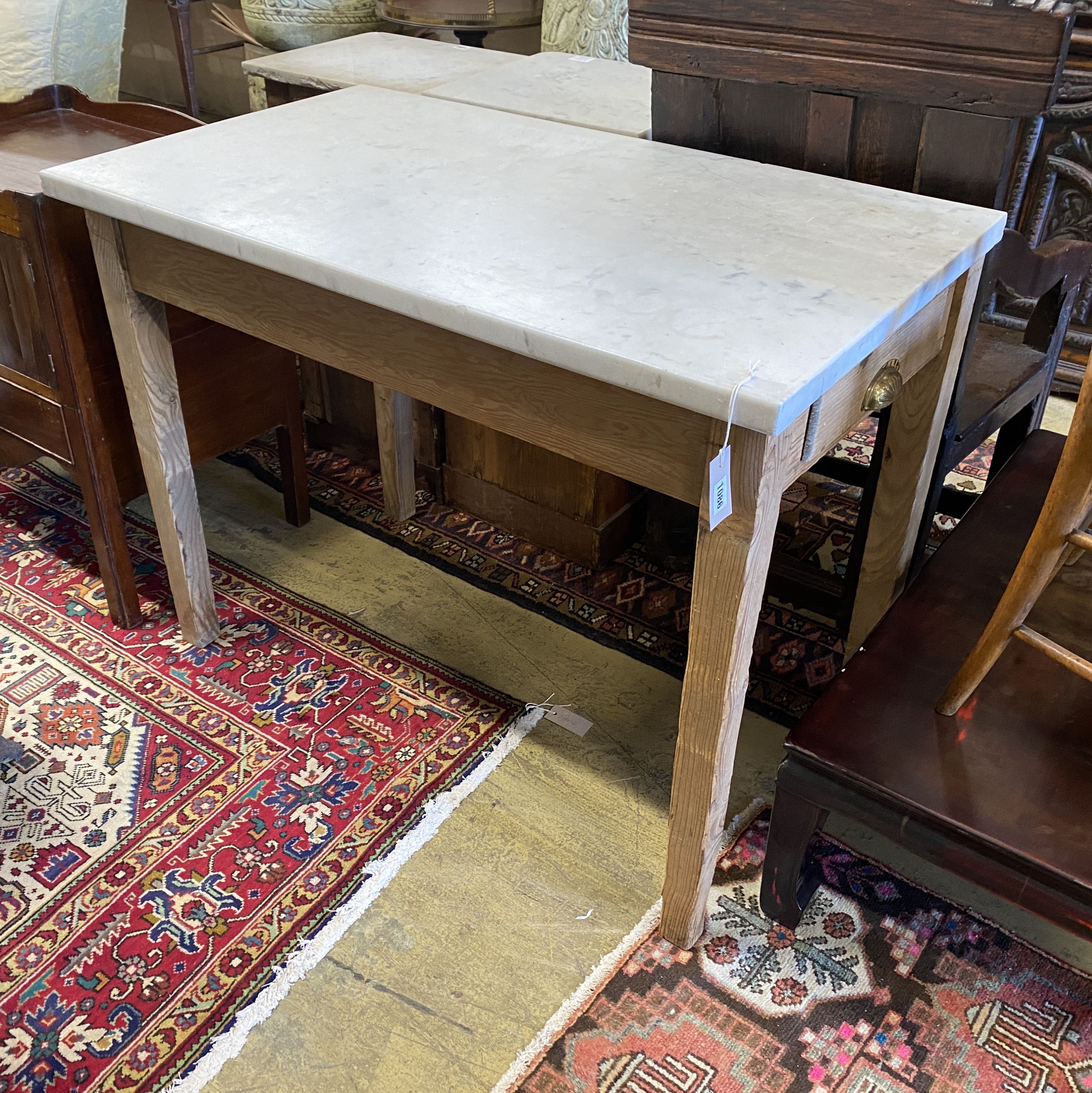 A Victorian rectangular pine marble top table, fitted drawer, width 101cm, depth 59cm, height 78cm